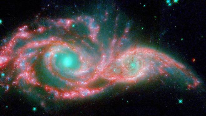 如果两个星系之间相互碰撞那么就会产生非常有趣的结果(图1)
